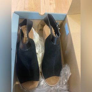 Brand new in box Toms, size 9.